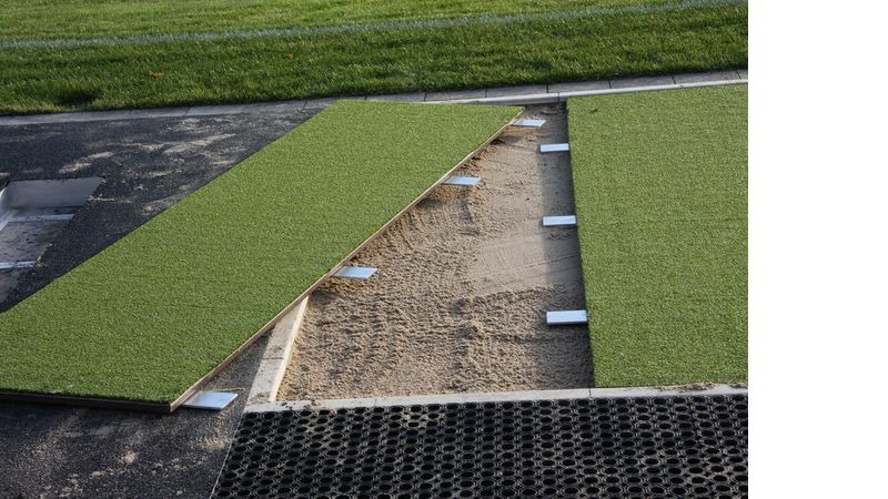 Cover of plywood with artificial turf